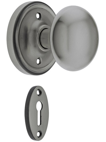 Classic Rosette Mortise Lock Set with Round Brass Knobs in Antique Pewter.